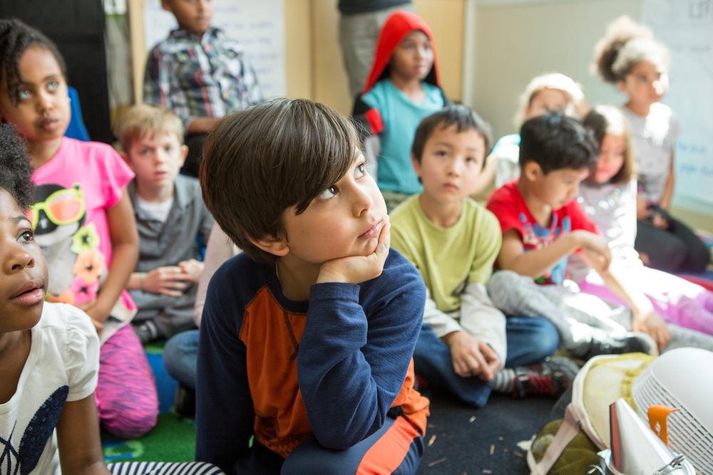 Group of children in a classroom.