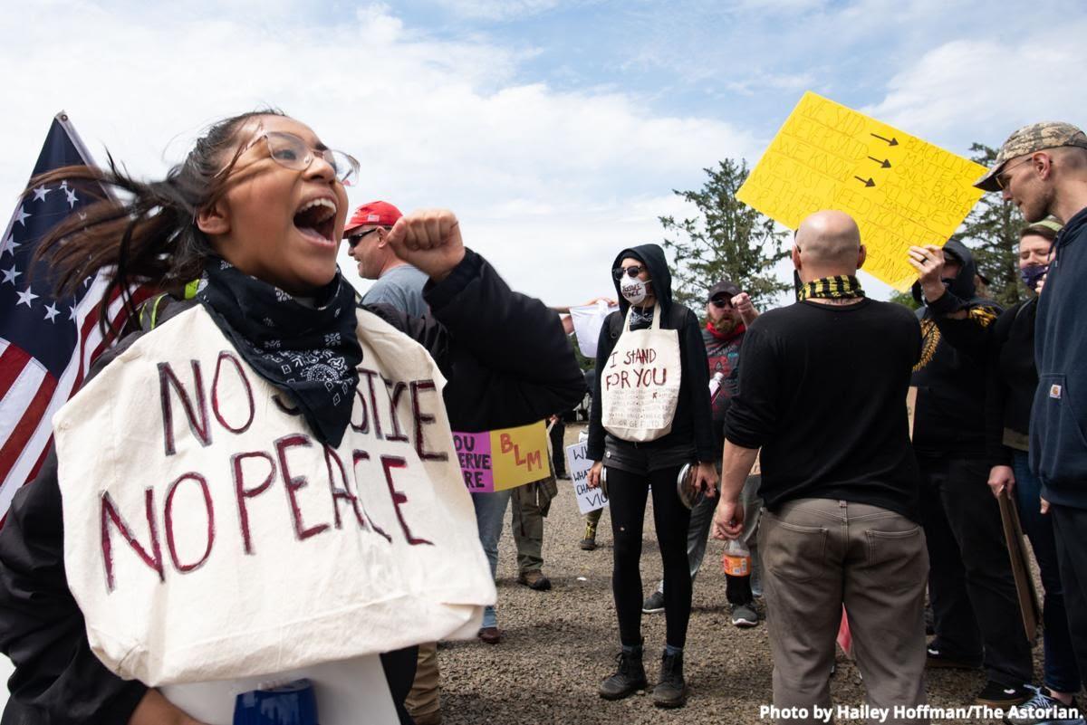 Alejandra Lopez chants 'Black Lives Matter' at a protest in Warrenton. Photo by Hailey Hoffman/The Astorian.