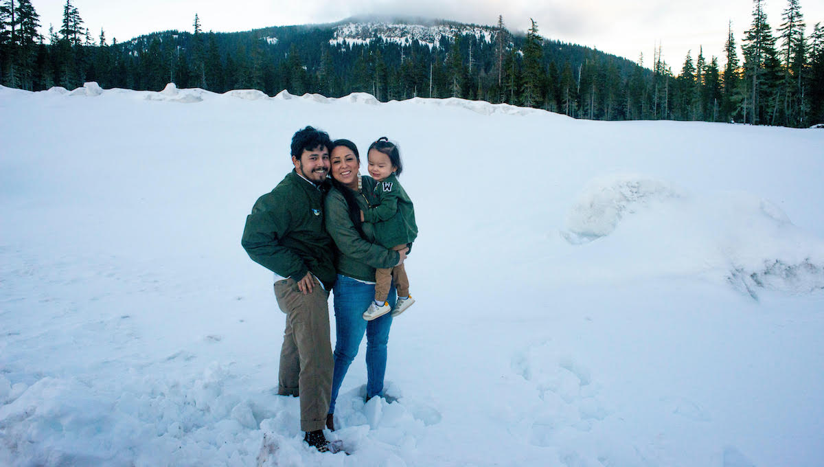 Carina Miller (center) with her partner, Lúkwaiya Lira, and their son, Waluxpykee Walter Miller.