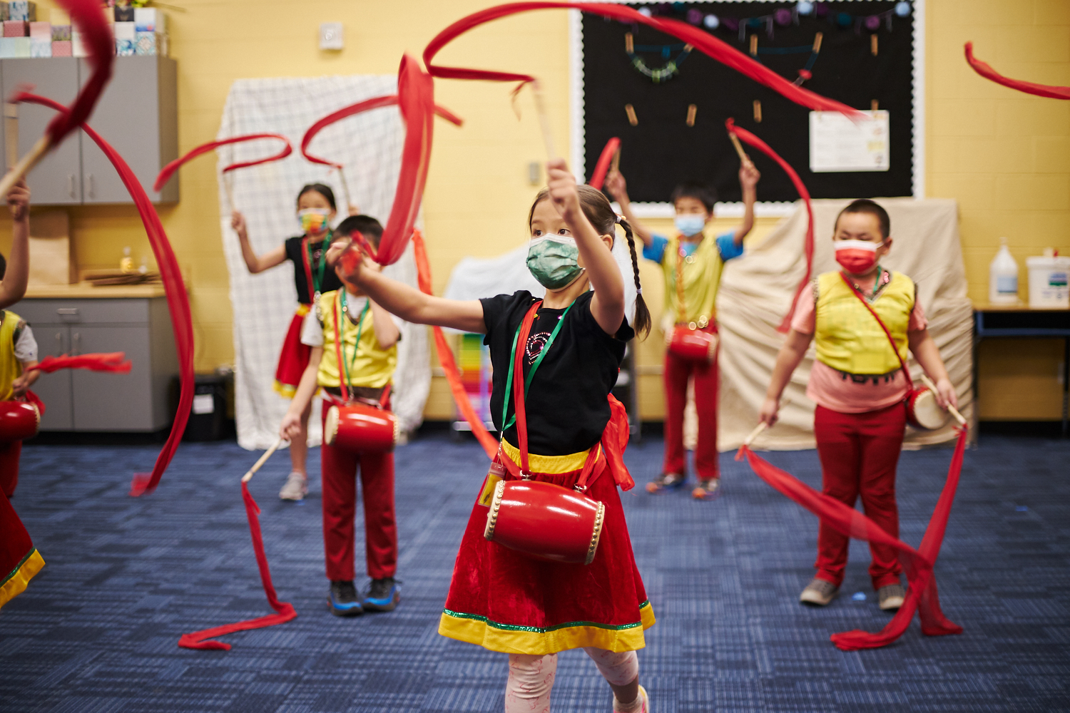 Students learn Chinese waist drumming at the Chinese Friendship Association's 2021 summer learning program in Beaverton.