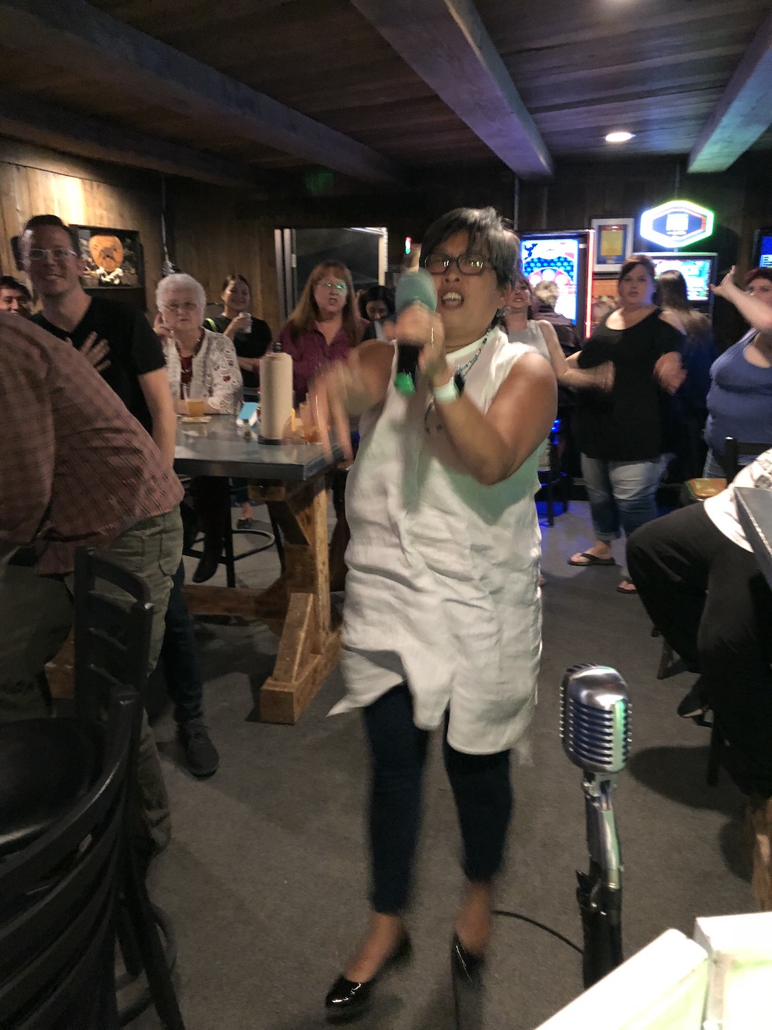Fearless behind a microphone, Carol Cheney takes colleagues out for a night of karaoke.